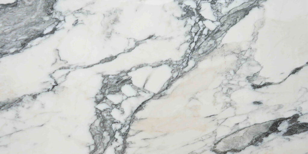 Calacatta Corchia white marble with strong black and grey veins